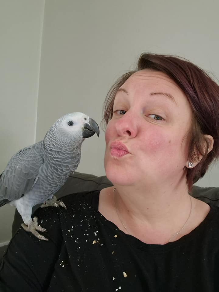 Debbie Bryon and her African Grey parrot DUCKIE